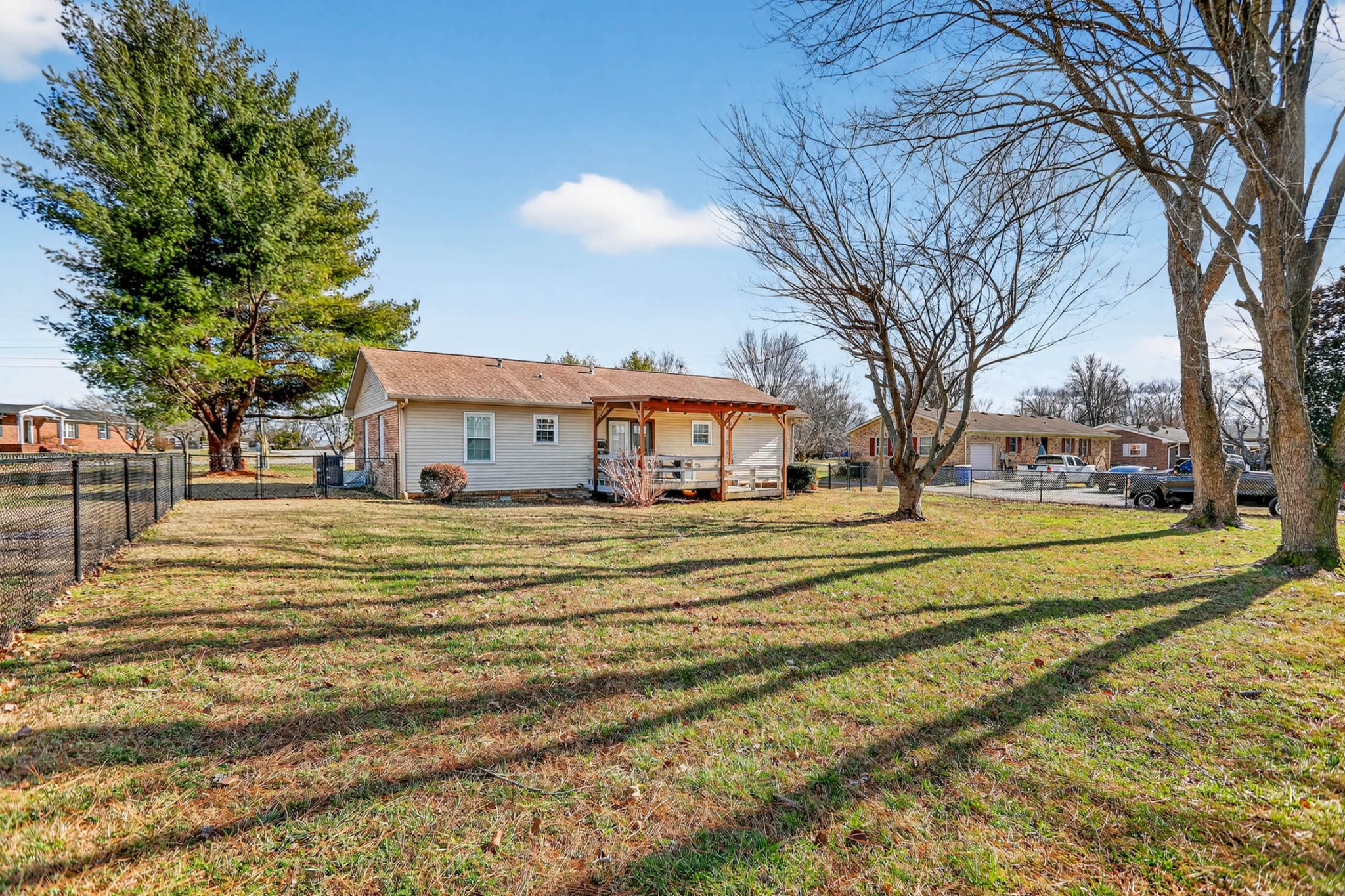 257 North Fairway Road Franklin, KY 42134 - Photo 2 of 30 a view of a swimming pool with a house in the background