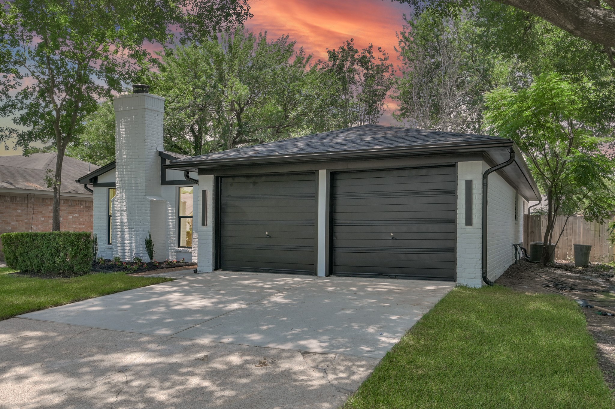 5015 Monteith Drive Spring, TX 77373 - Photo 1 of 44 a front view of a house with a garden