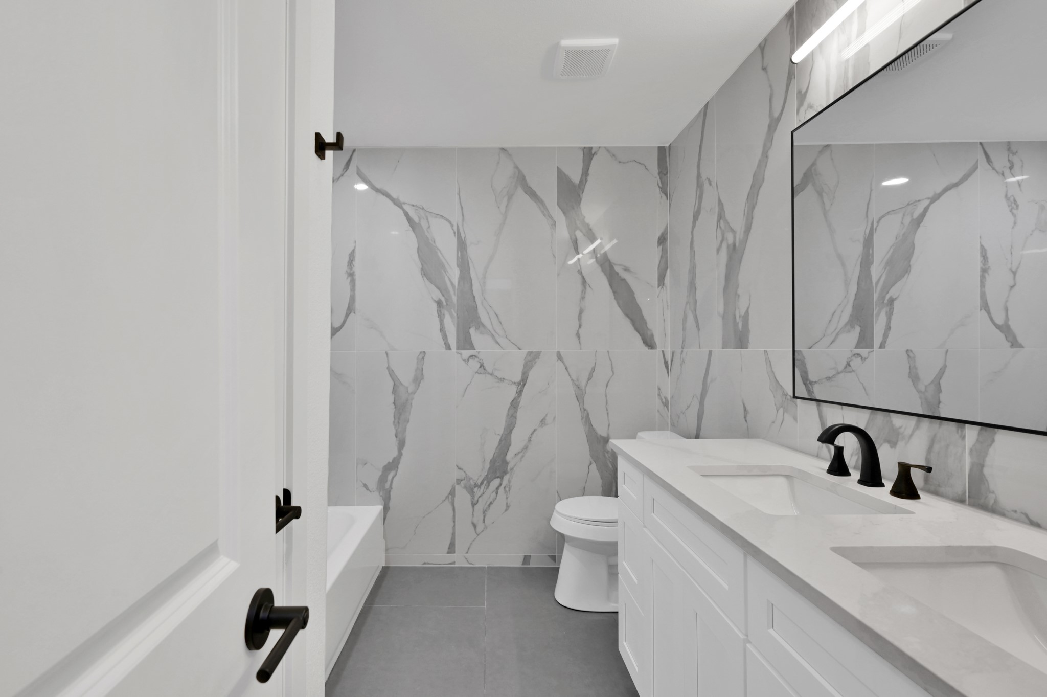 5015 Monteith Drive Spring, TX 77373 - Photo 27 of 44 a bathroom with a sink a toilet and a shower