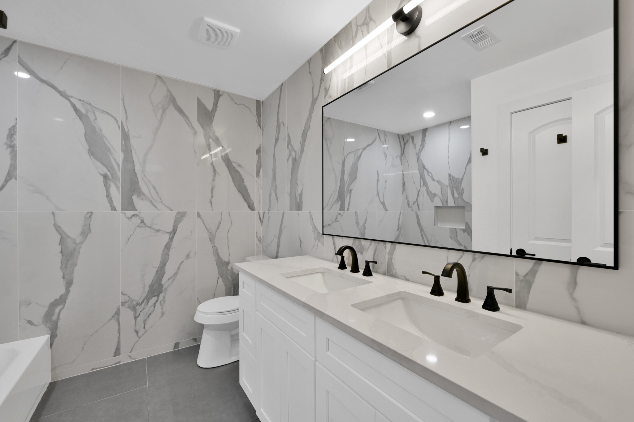 5015 Monteith Drive Spring, TX 77373 - Photo 28 of 44 a bathroom with a sink and a mirror