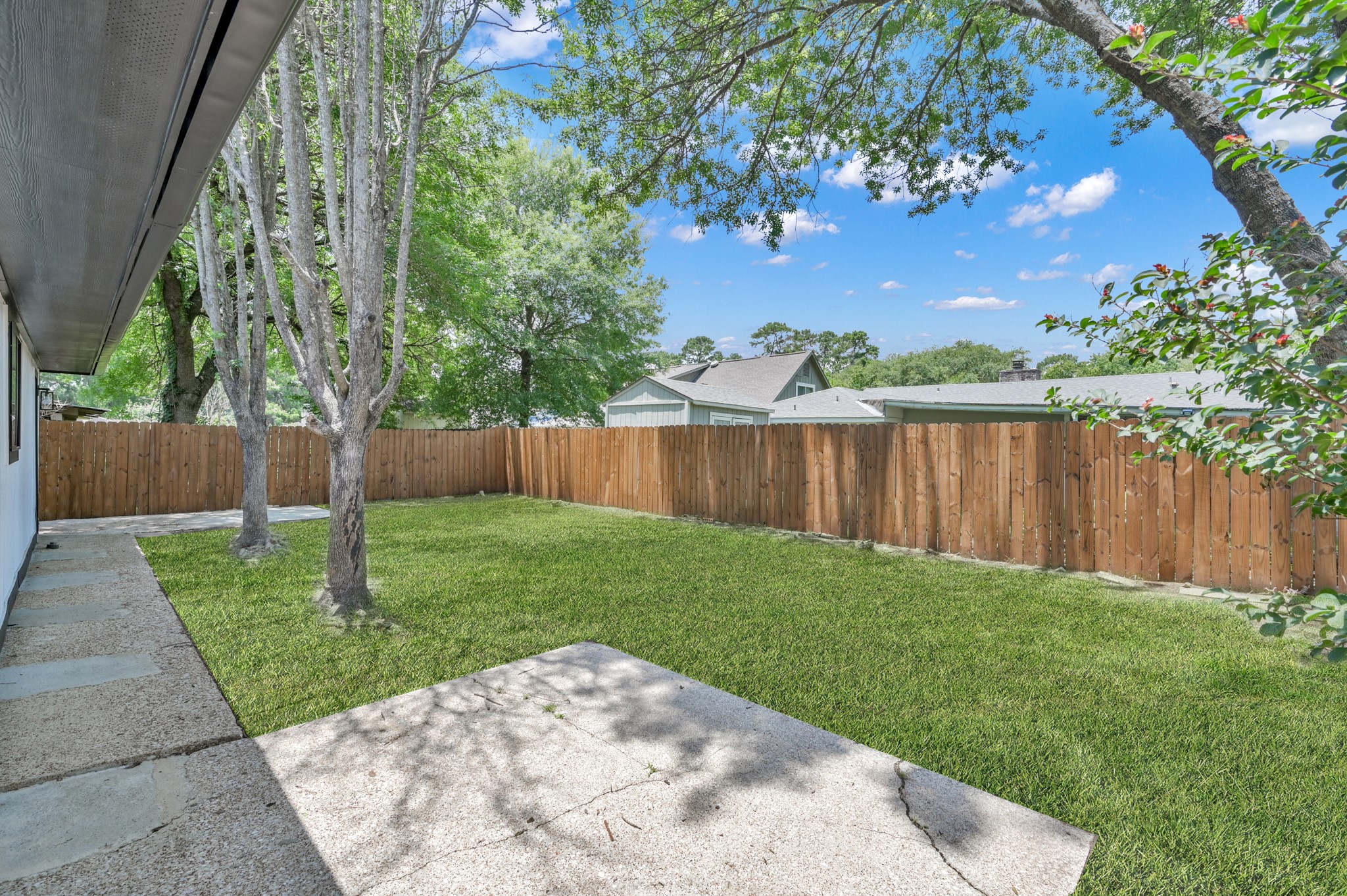 5015 Monteith Drive Spring, TX 77373 - Photo 42 of 44 a view of a backyard with a garden