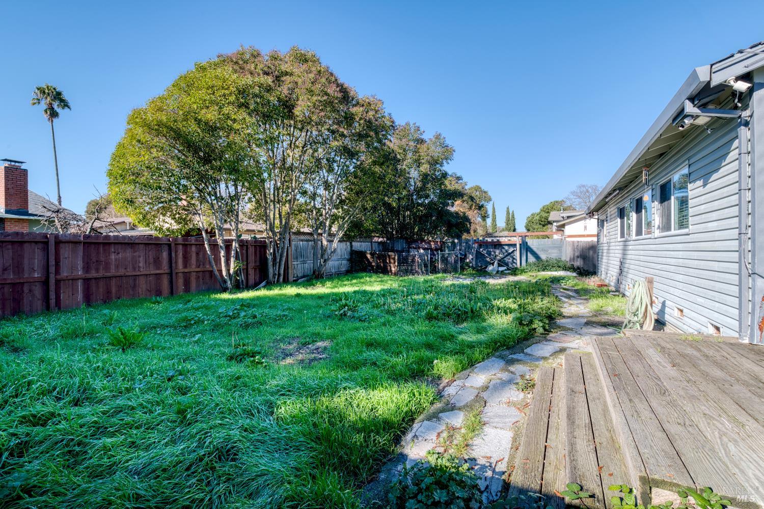 7517 Bobbie Way Rohnert Park, CA 94928 - Photo 15 of 18 a view of a house with a backyard