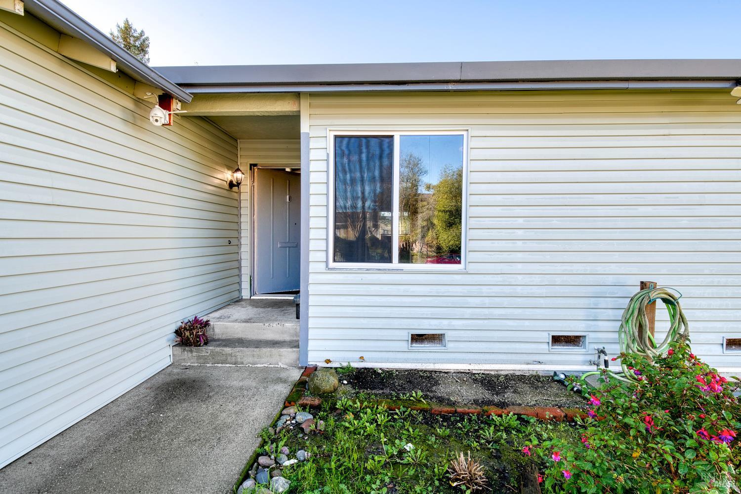 7517 Bobbie Way Rohnert Park, CA 94928 - Photo 3 of 18 a view of a back yard of the house