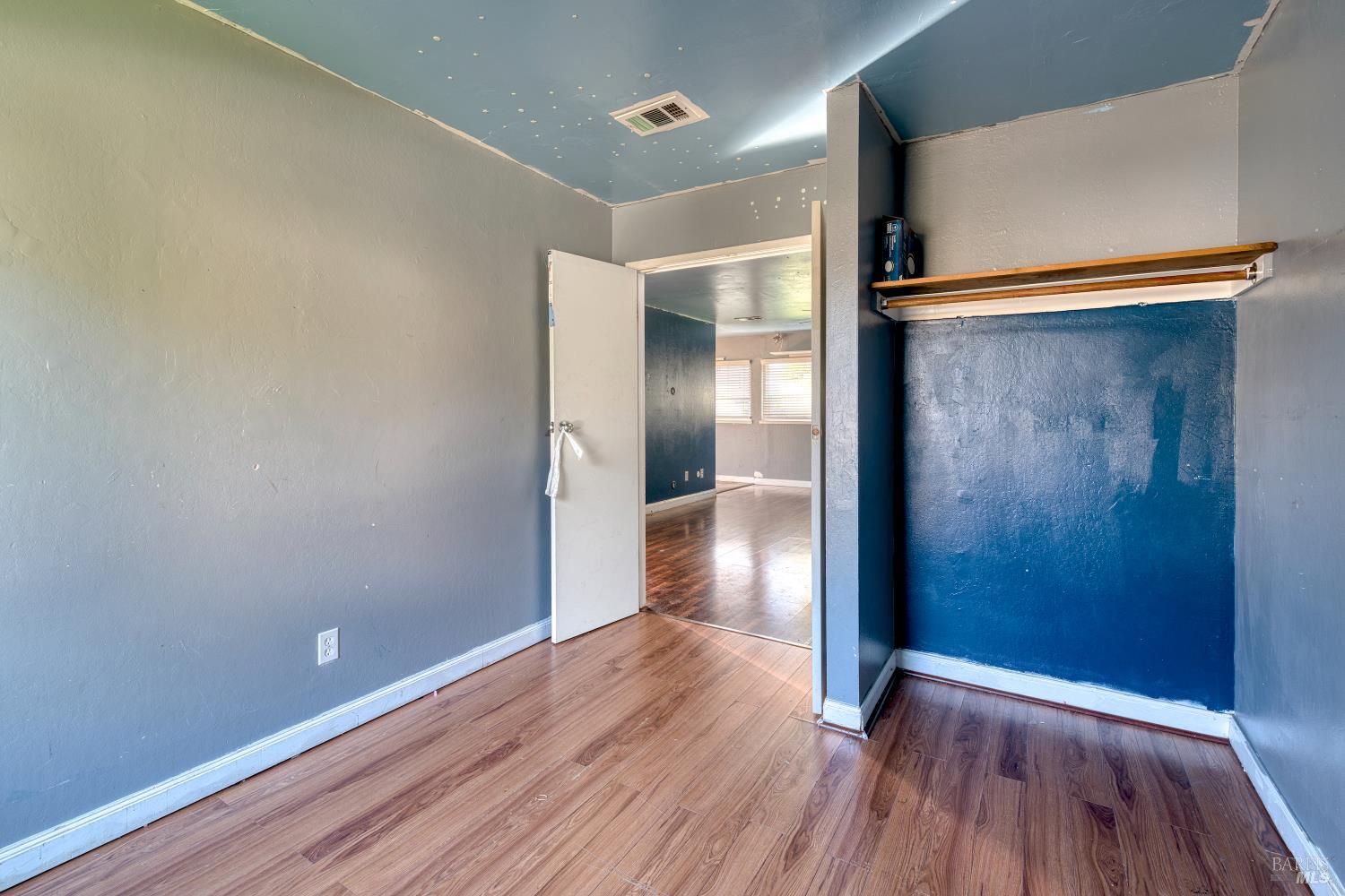 7517 Bobbie Way Rohnert Park, CA 94928 - Photo 7 of 18 a view of an empty room with wooden floor