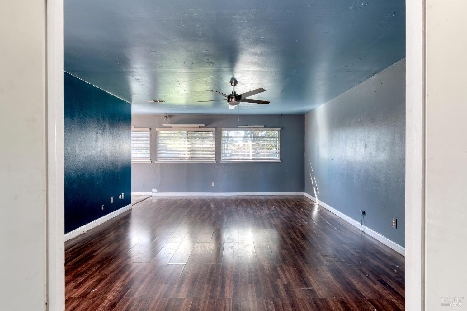 7517 Bobbie Way Rohnert Park, CA 94928 - Photo 8 of 18 wooden floor in an empty room with a window