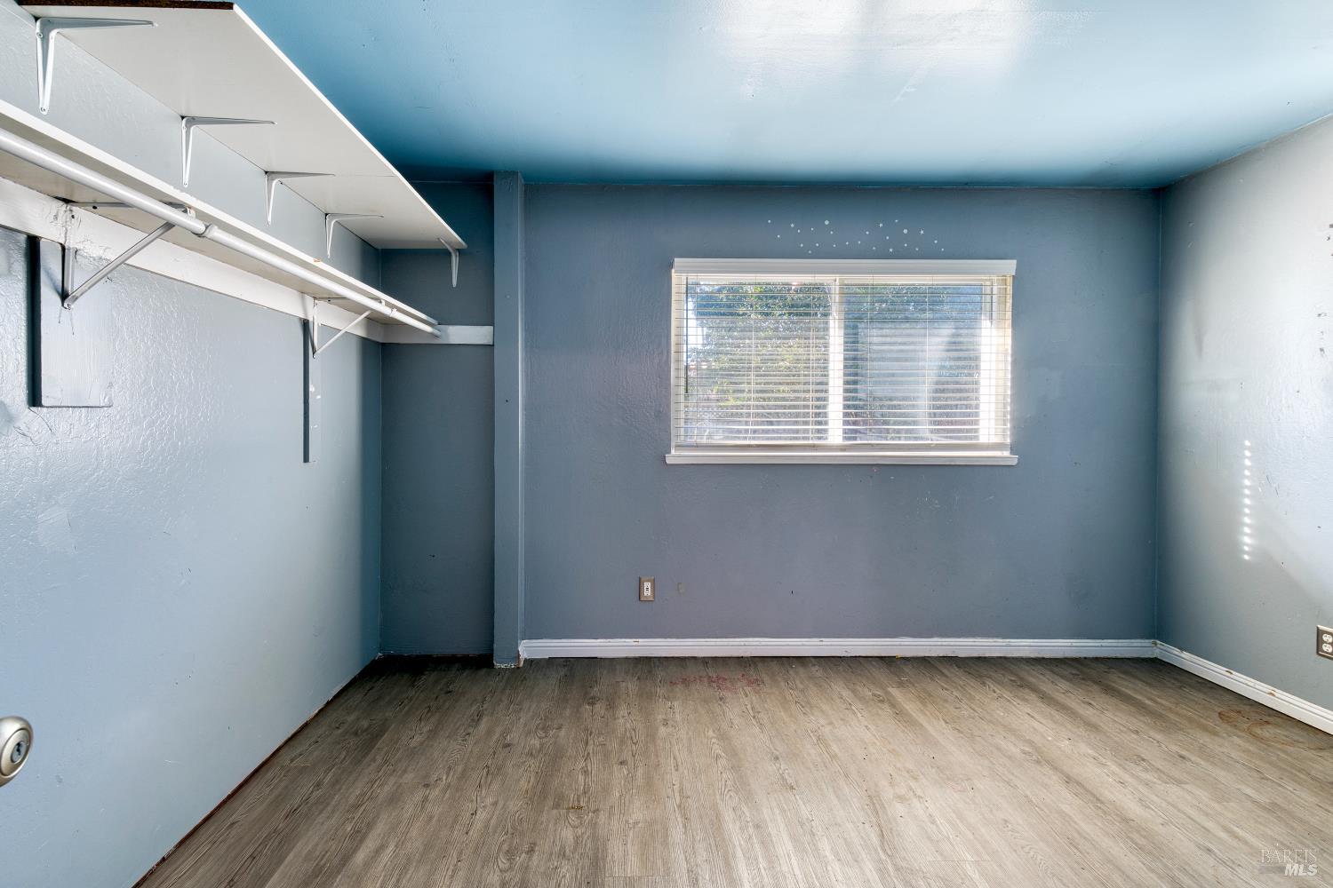 7517 Bobbie Way Rohnert Park, CA 94928 - Photo 10 of 18 a view of a livingroom with an empty space and a window