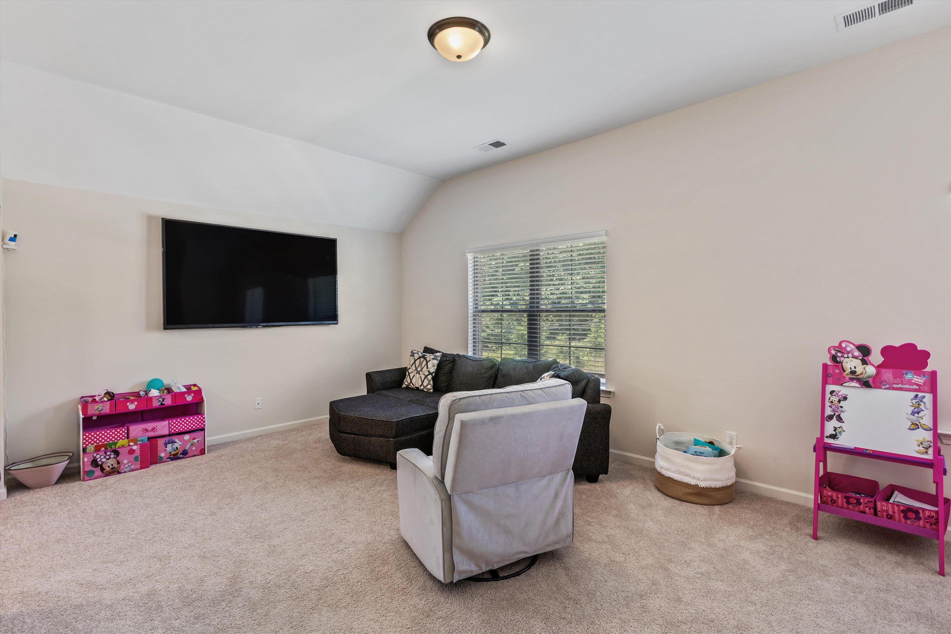 10139 Macon Road Cordova, TN 38018 - Photo 19 of 31 Carpeted room with a tray ceiling and recessed lighting