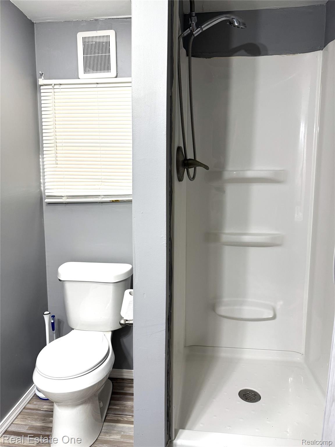 786 Chestnut Street Fowlerville, MI 48836 - Photo 14 of 19 Walk-in shower with integrated shelving