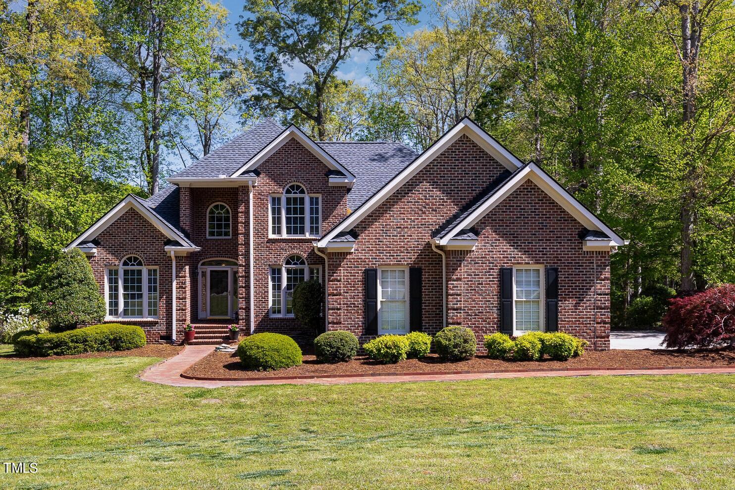 3705 La Costa Way Raleigh, NC 27610 - Photo 1 of 40 a front view of house with yard and green space
