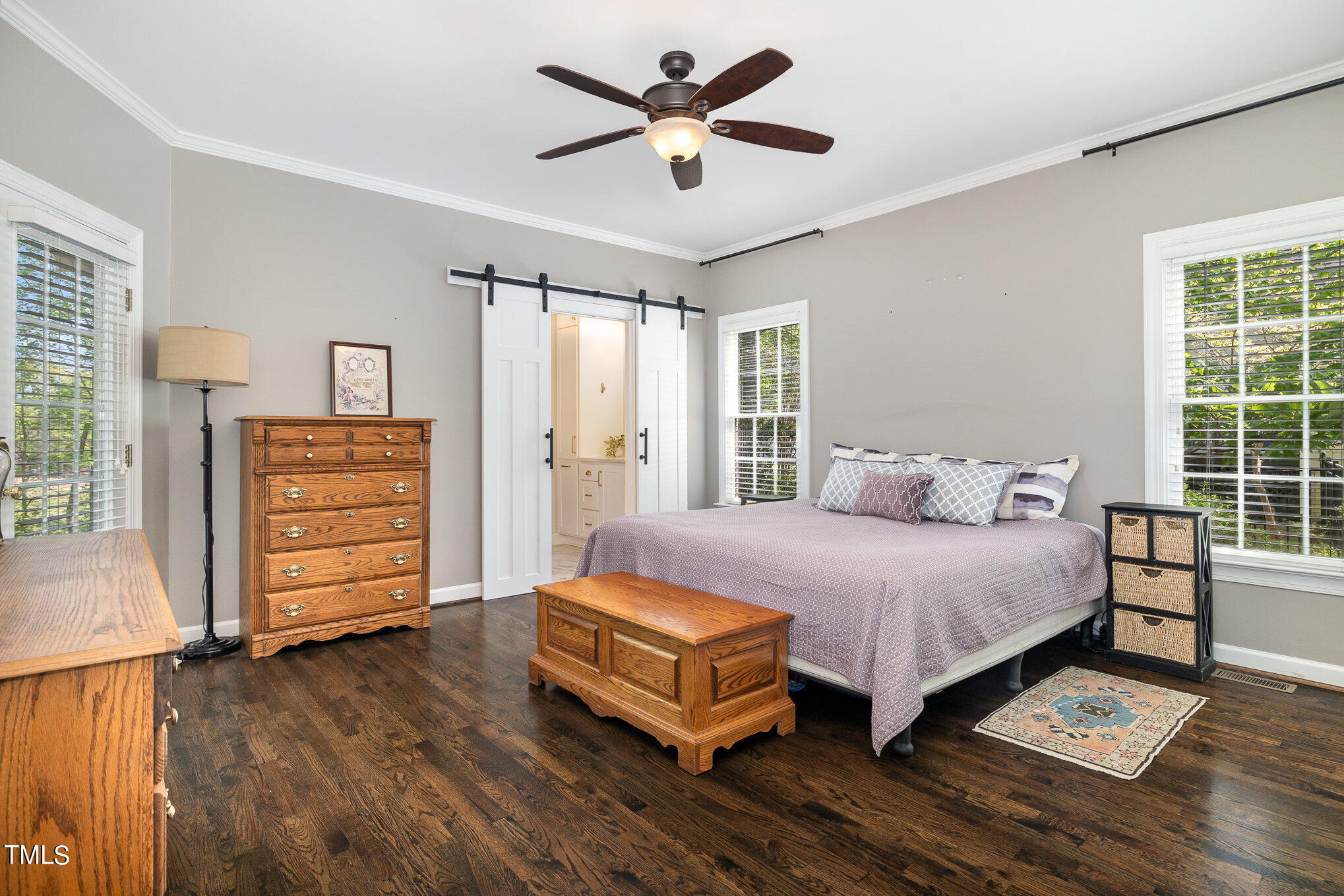3705 La Costa Way Raleigh, NC 27610 - Photo 14 of 40 a spacious bedroom with a bed and wooden floor