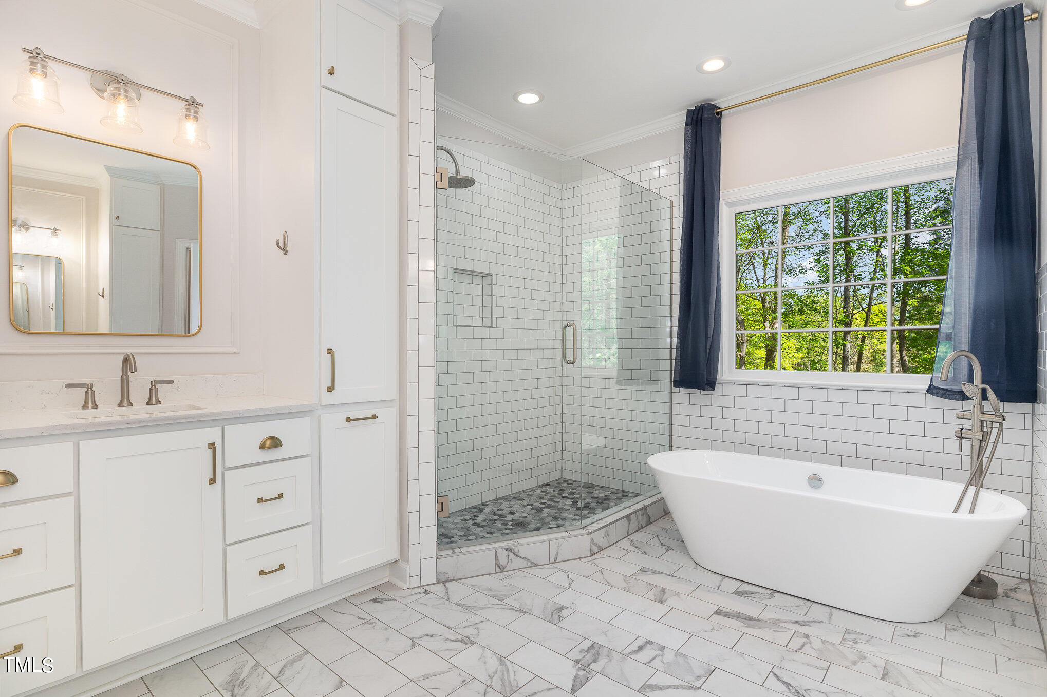 3705 La Costa Way Raleigh, NC 27610 - Photo 15 of 40 a bathroom with a bathtub sink and toilet
