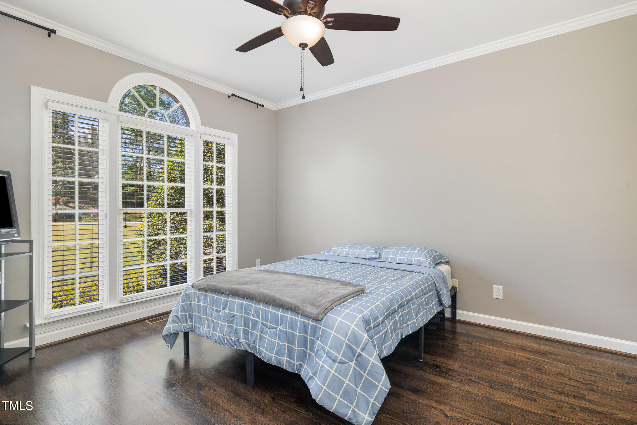 3705 La Costa Way Raleigh, NC 27610 - Photo 17 of 40 a bedroom with a large bed and a large window