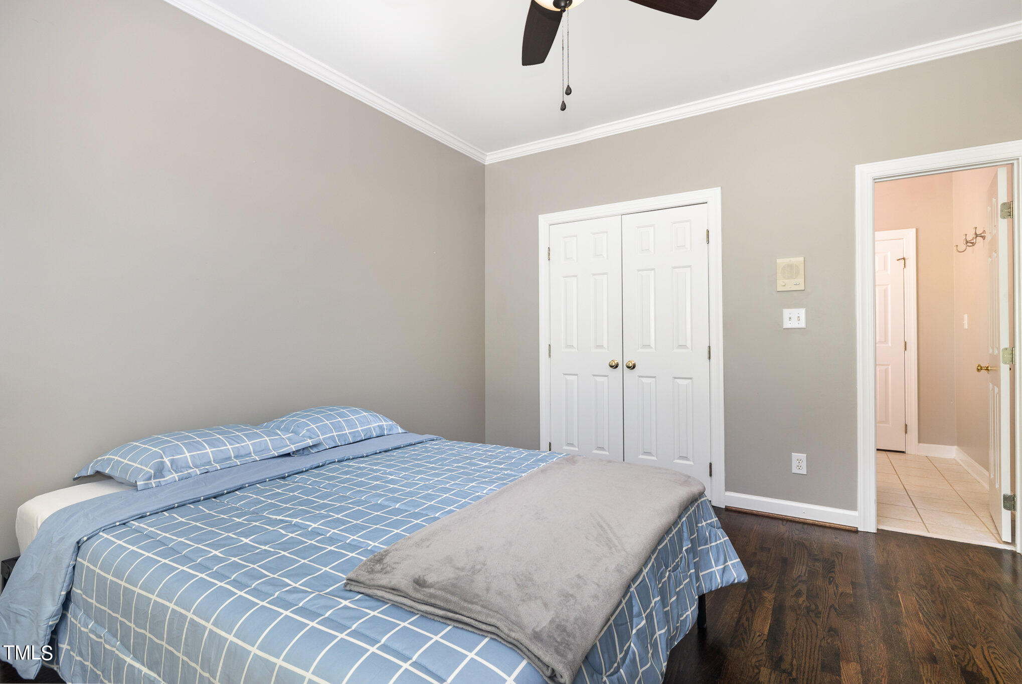 3705 La Costa Way Raleigh, NC 27610 - Photo 18 of 40 a bedroom with a bed and wooden floor