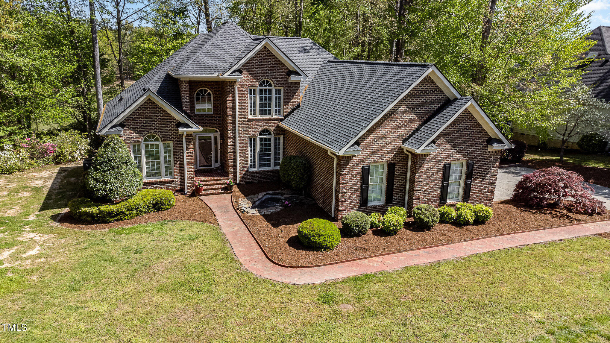3705 La Costa Way Raleigh, NC 27610 - Photo 2 of 40 a front view of a house with a yard