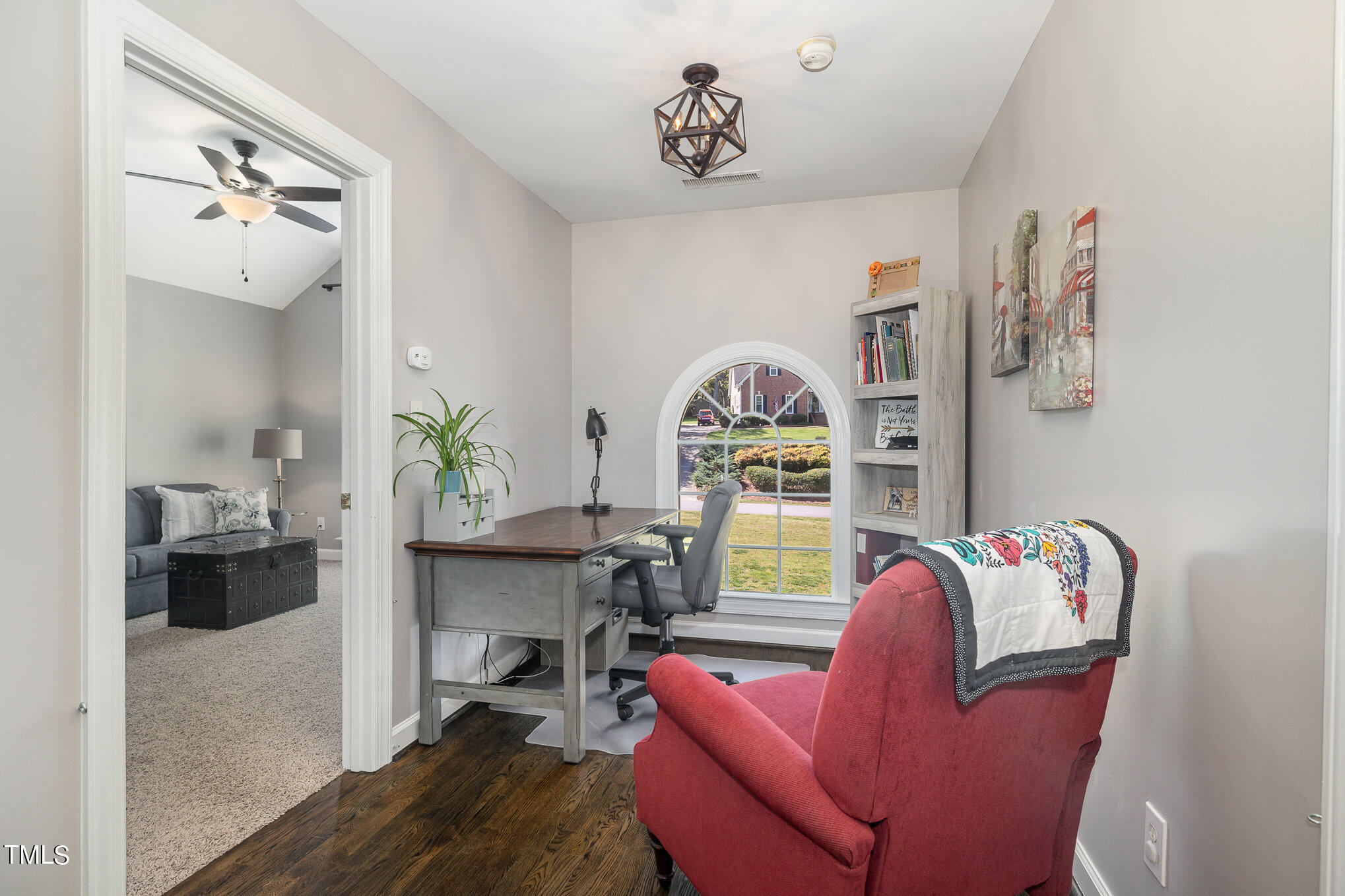 3705 La Costa Way Raleigh, NC 27610 - Photo 22 of 40 a living room with furniture and a wooden floor