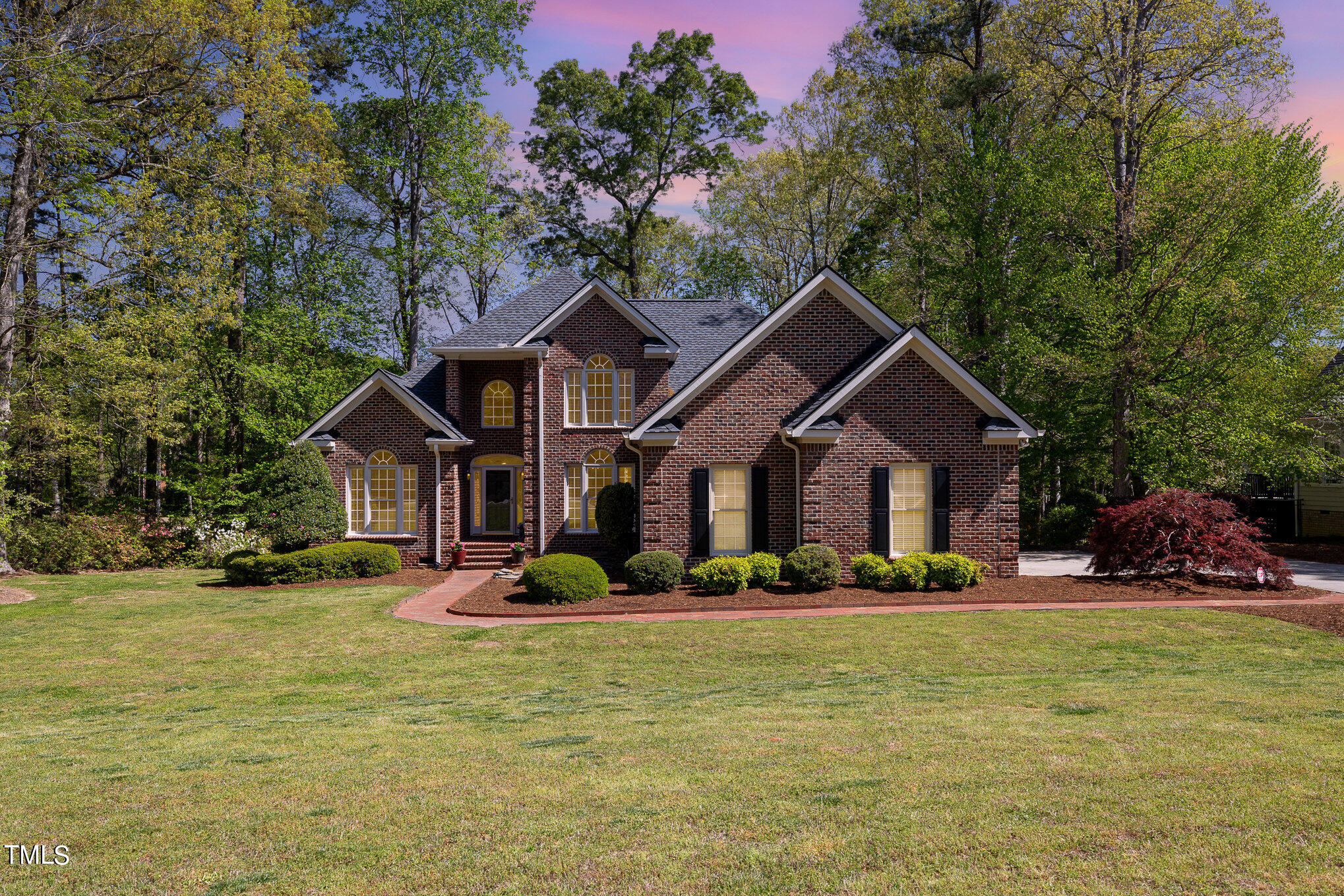 3705 La Costa Way Raleigh, NC 27610 - Photo 39 of 40 a front view of a house with garden