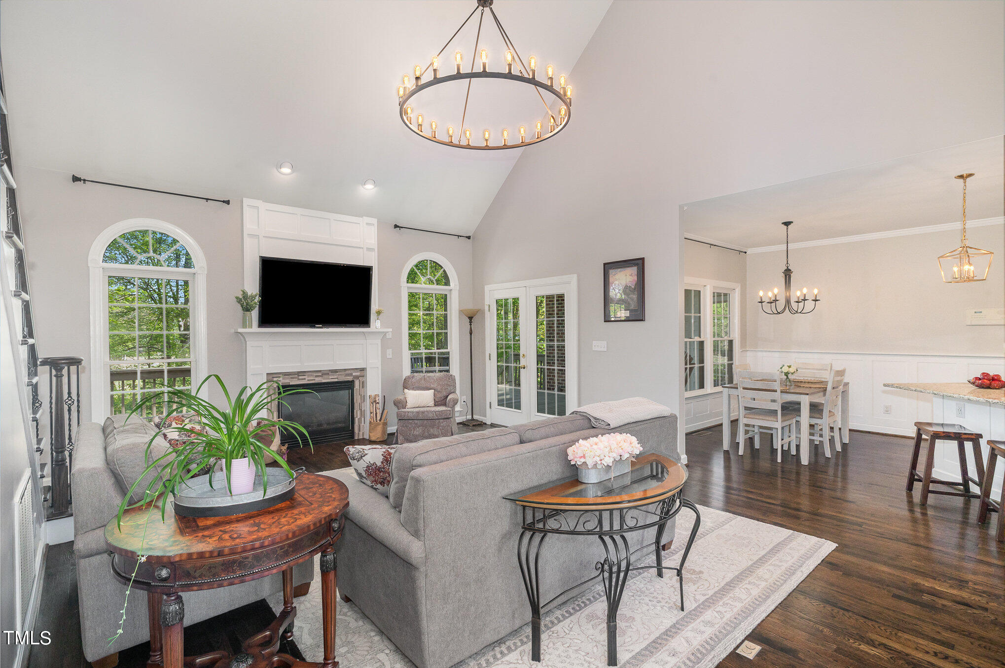 3705 La Costa Way Raleigh, NC 27610 - Photo 5 of 40 a dining room with furniture a chandelier and wooden floor