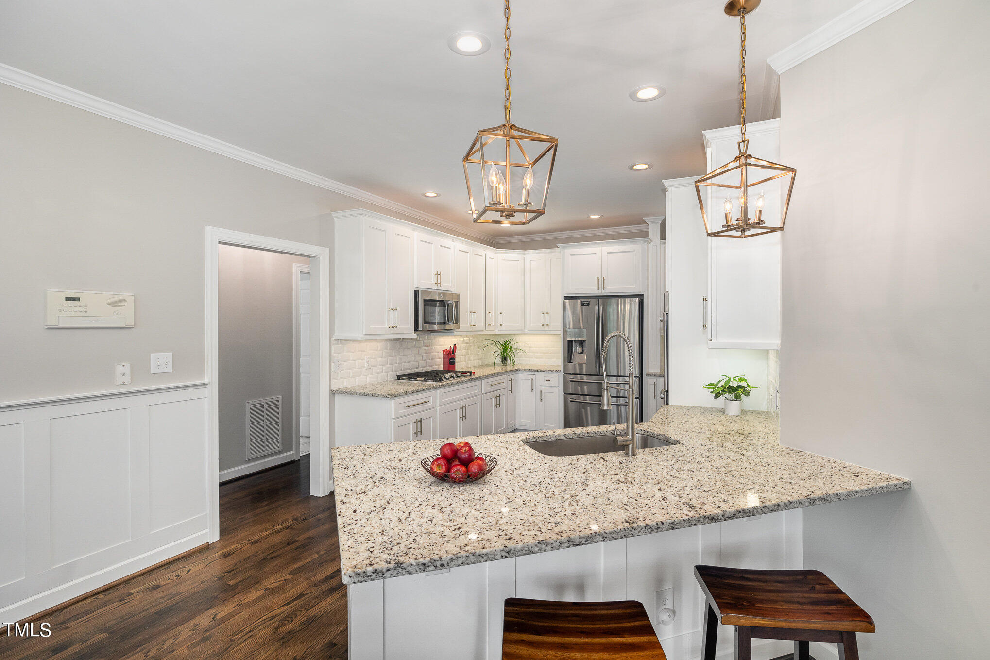 3705 La Costa Way Raleigh, NC 27610 - Photo 8 of 40 a kitchen with refrigerator and microwave