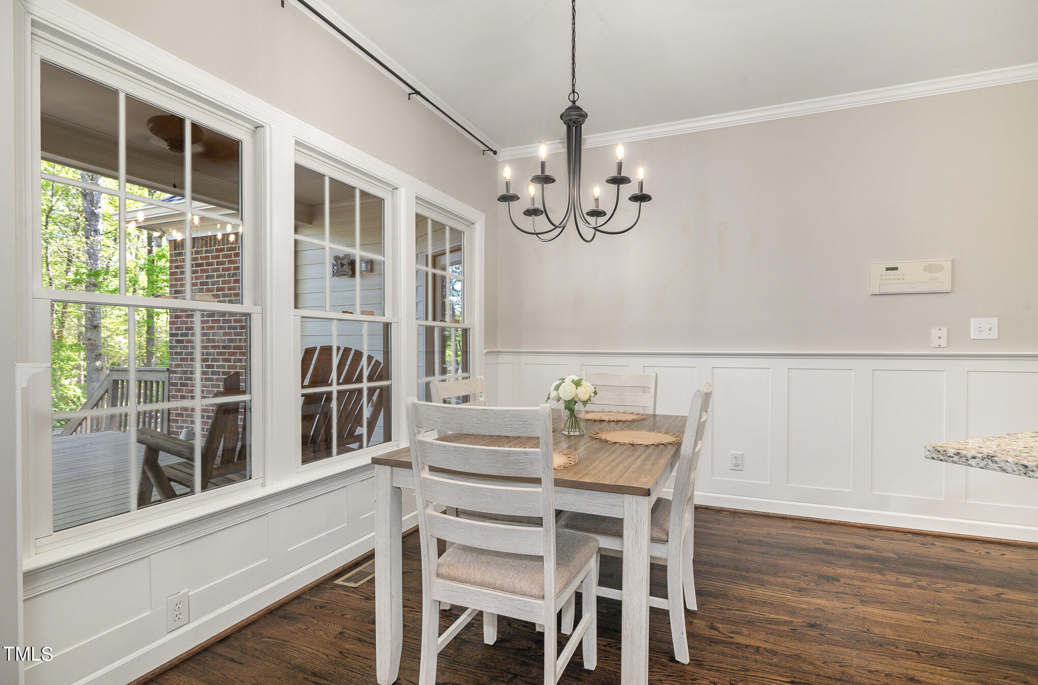 3705 La Costa Way Raleigh, NC 27610 - Photo 10 of 40 a view of a dining room with furniture window and wooden floor