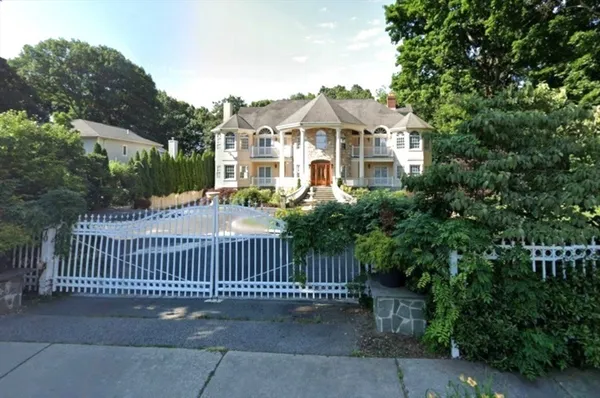 a view of deck with wooden floor and fence
