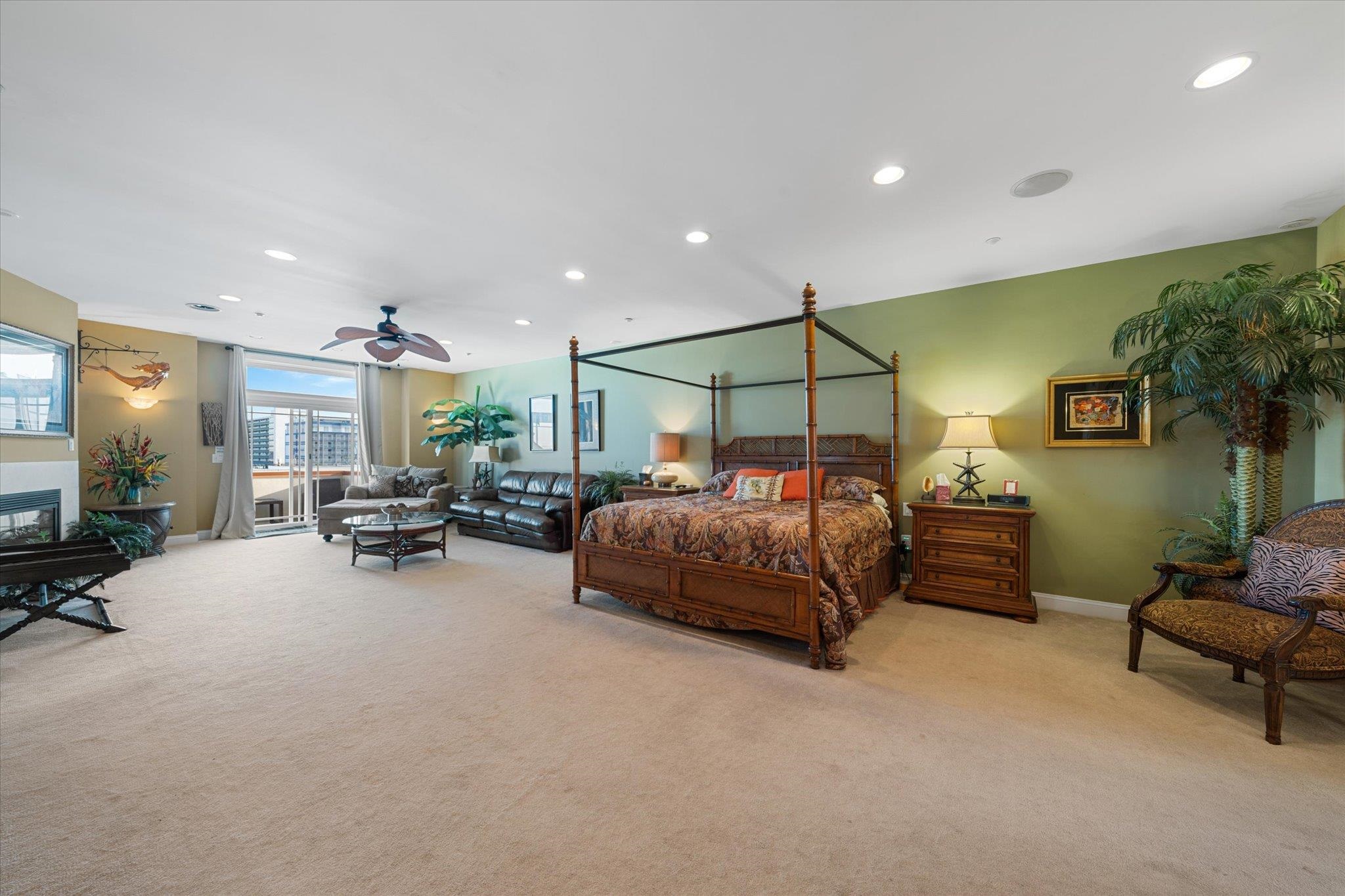 420 East Lavender Road, Unit 420 Wildwood Crest, NJ 08260 - Photo 29 of 41 a bedroom with furniture and a flat screen tv