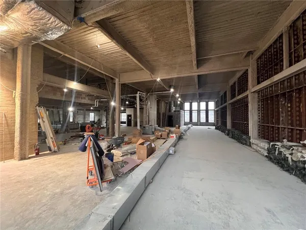 a view of a livingroom with wooden floor
