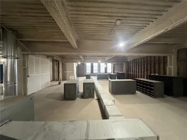 a city room with lots of wooden furniture
