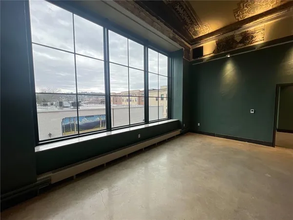 an empty room with windows
