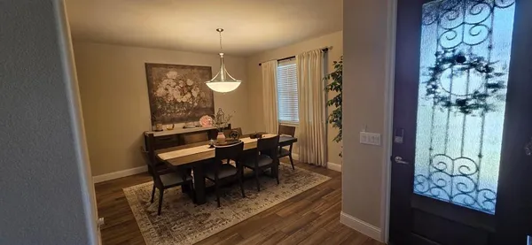 a view of a livingroom with furniture and window