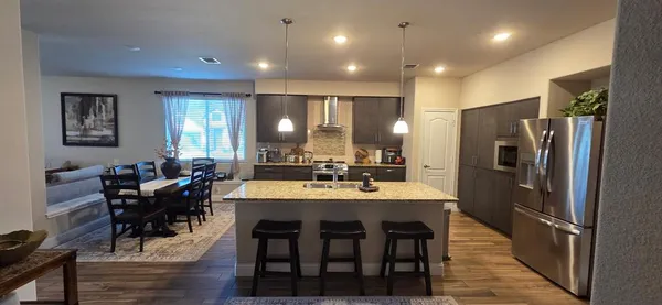 a view of a dining room with furniture