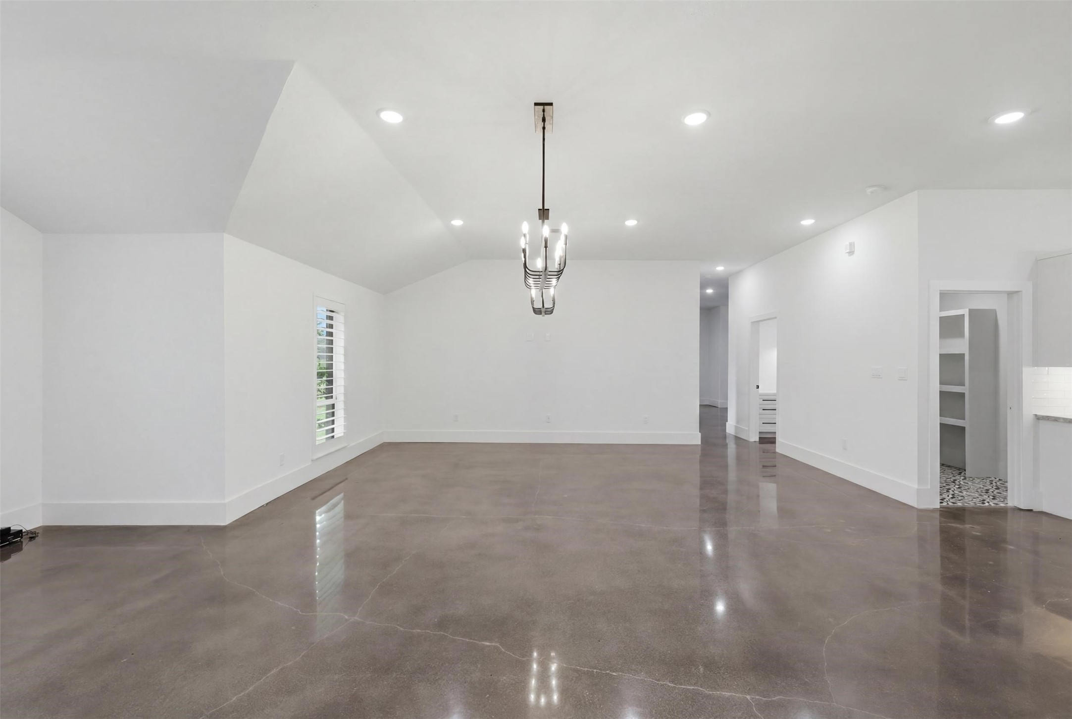 1589 County Road 252 Anderson, TX 77830 - Photo 10 of 50 a view of an empty room with wooden floor and windows