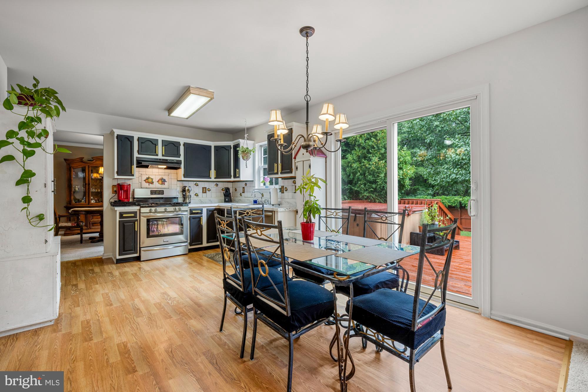 338 Sapling Way Atco, NJ 08004 - Photo 17 of 34 a view of a dining room with furniture window and wooden floor