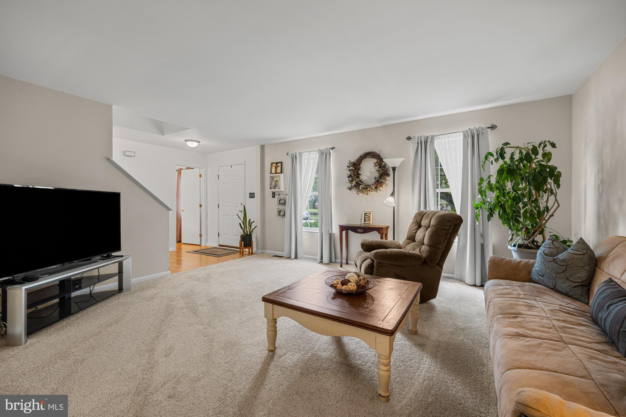 338 Sapling Way Atco, NJ 08004 - Photo 8 of 34 a living room with furniture and a flat screen tv