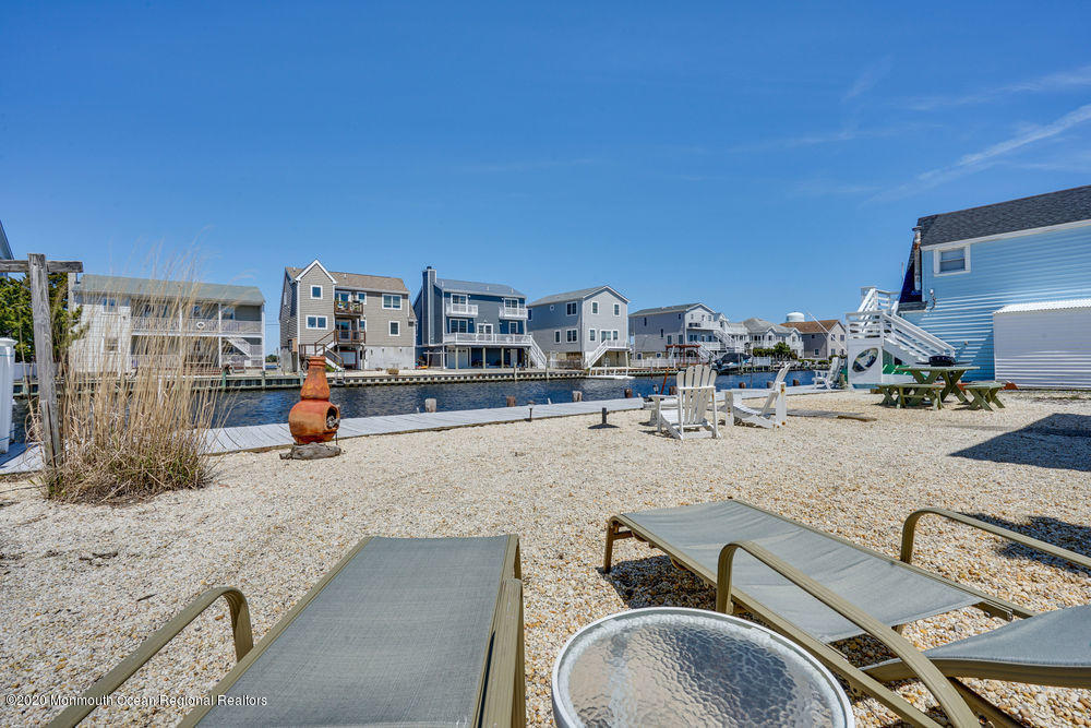 292 N Street, Unit A1 Seaside Park, NJ 08752 - Photo 29 of 31 a view of a kitchen with a sink and living area