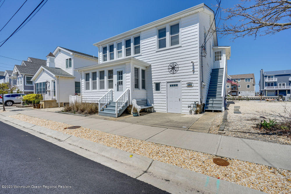 292 N Street, Unit A1 Seaside Park, NJ 08752 - Photo 3 of 31 a front view of a building with street