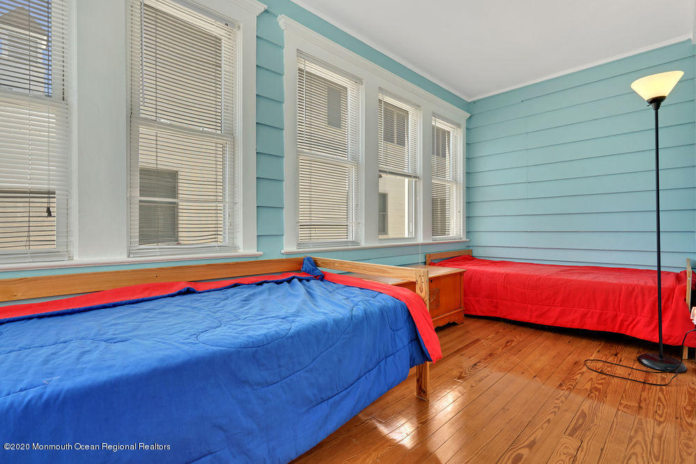292 N Street, Unit A1 Seaside Park, NJ 08752 - Photo 9 of 31 a view of swimming pool with red chair
