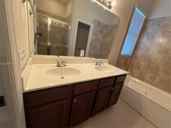 a bathroom with a toilet and a sink