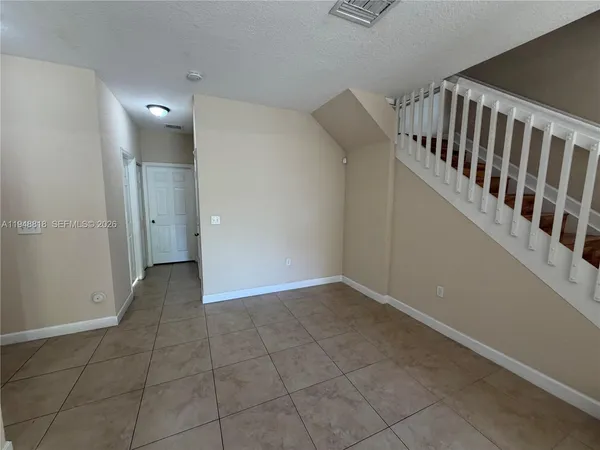 a view of entryway with stairs