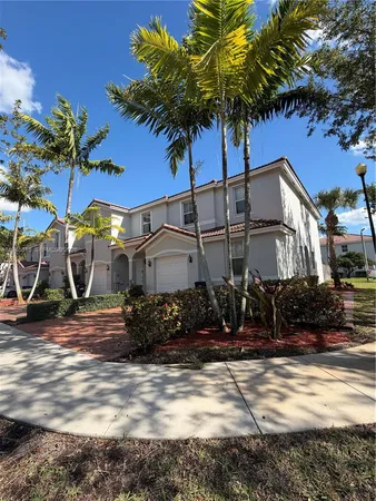 a view of a house with a street