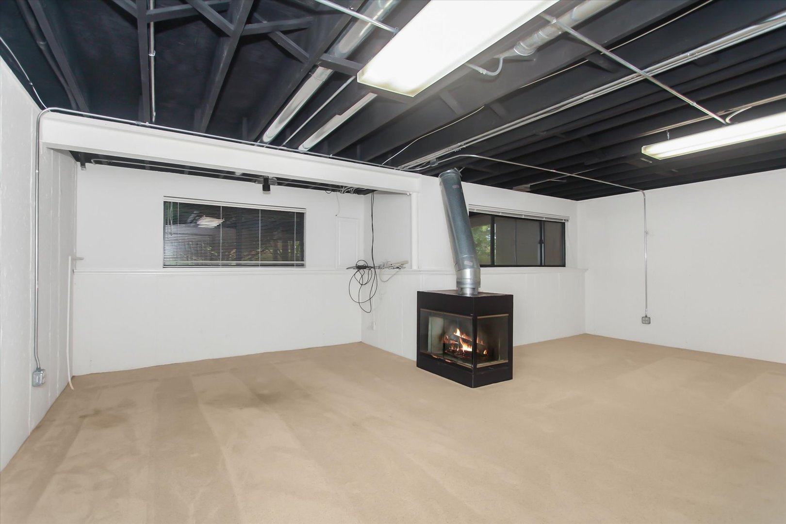 928 Longmeadow Court, Unit 1016 Barrington, IL 60010 - Photo 20 of 32 a living room with stainless steel appliances kitchen island a stove and a microwave