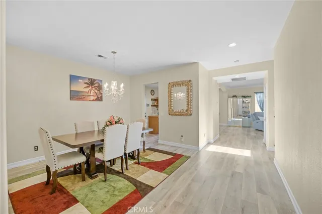 a workspace with furniture and view of bathroom