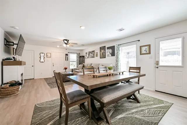 a view of a dining room with furniture