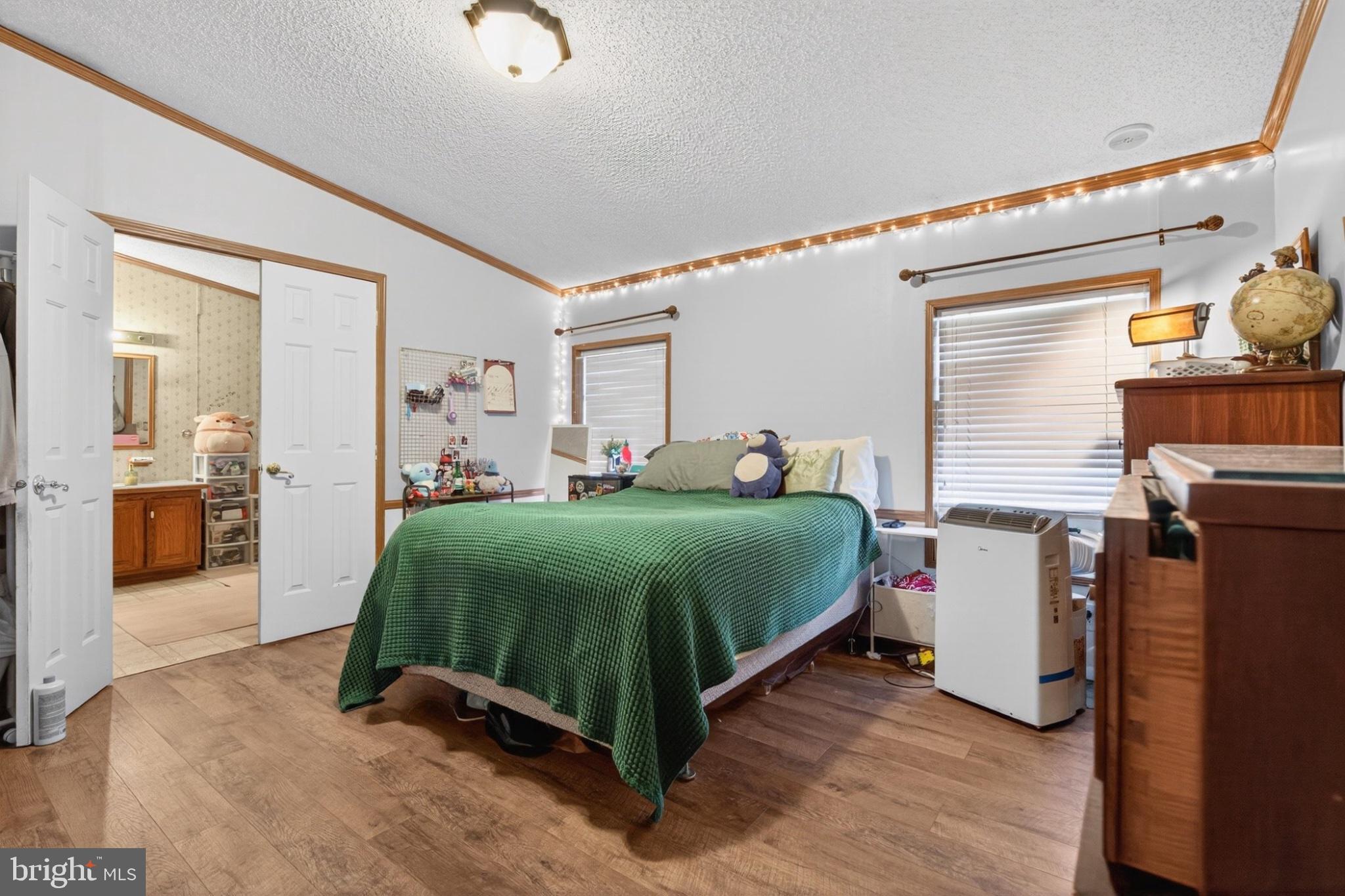 201 Northcrest Acres Lebanon, PA 17046 - Photo 4 of 22 Cozy bedroom with warm lighting.