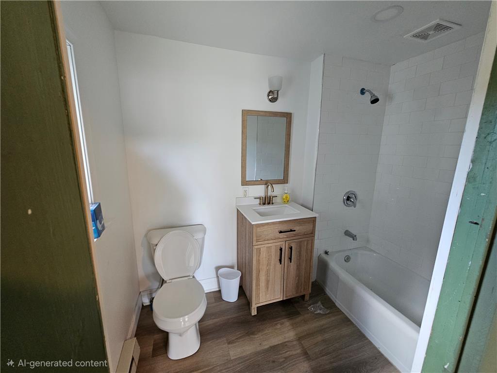 9128 Slateville Road Kempton, PA 19529 - Photo 11 of 13 A well-appointed bathroom with durable flooring and modern fixtures awaits.