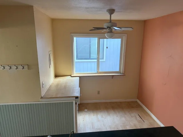 an empty room with windows