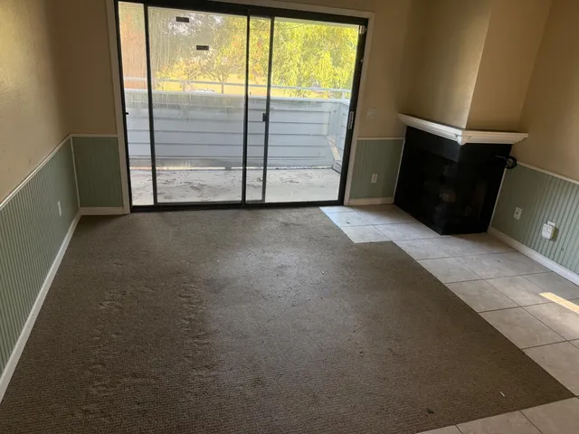 a view of a livingroom with a staircase