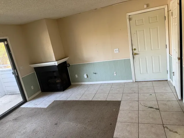 a view of a balcony with wooden floor
