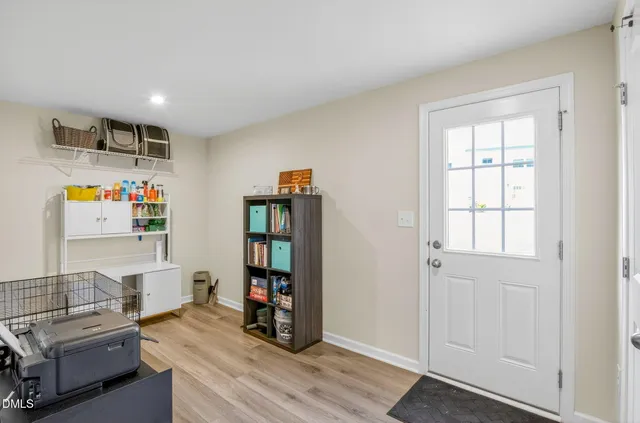 a room with furniture a couch and a window