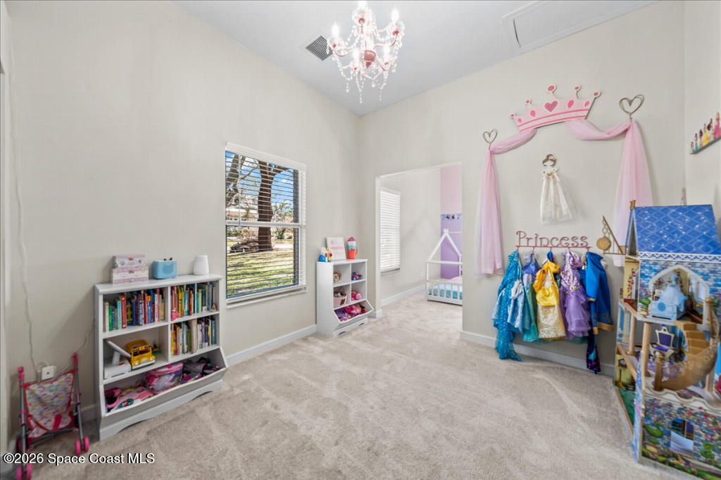 35 River Ridge Drive Rockledge, FL 32955 - Photo 21 of 48 a view of a room with lots of baby toys