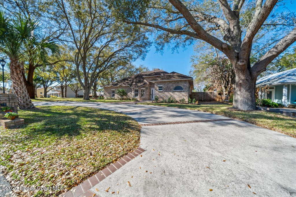 35 River Ridge Drive Rockledge, FL 32955 - Photo 35 of 48 a view of yard with large tree